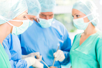 Doctors performing Peyronie's surgery